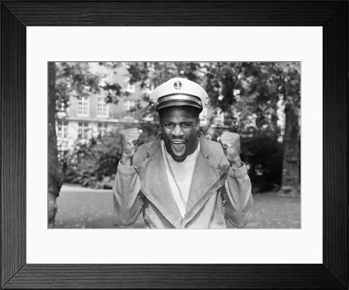 Framed Print : Boxer Errol Christie wearing a sailors hat. 28th August 1986