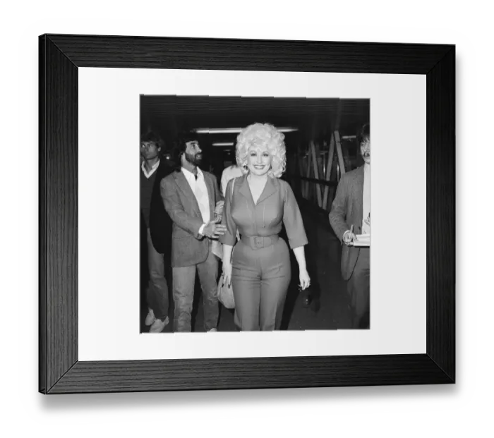 Framed Print : Country & Western singer Dolly Parton arrving at London Airport. 22nd March 1983 Framed Print : Country & Western singer Dolly Parton arrving at London Airport. 22nd March 1983