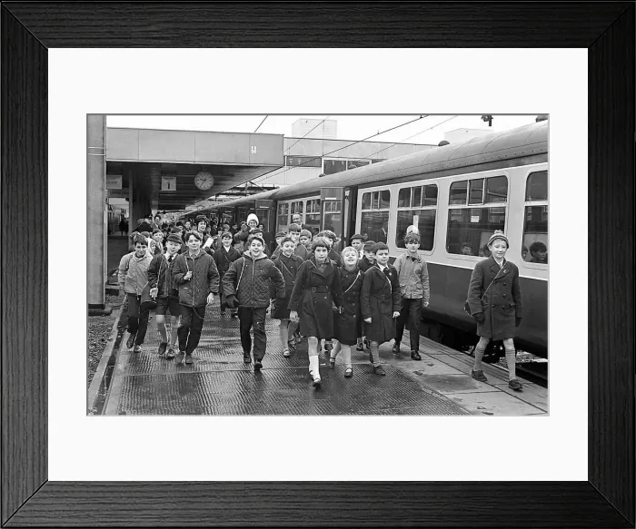 Framed Print : Around 1, 200 schoolchildren walking along the platform to board one of two special Framed Print : Around 1, 200 schoolchildren walking along the platform to board one of two special