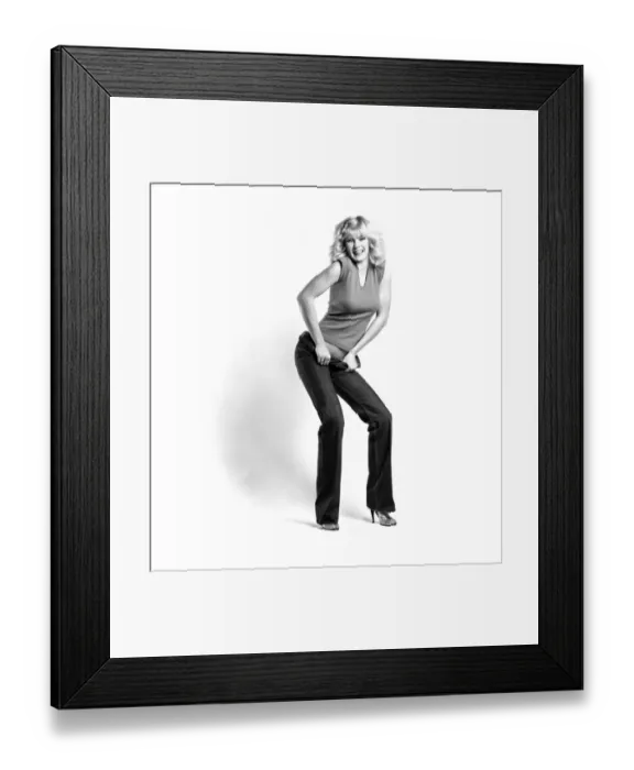 Framed Print : Fashion: Clothing: A woman pulling up a pair of denim jeans. January 1981 81-00051-007 Framed Print : Fashion: Clothing: A woman pulling up a pair of denim jeans. January 1981 81-00051-007