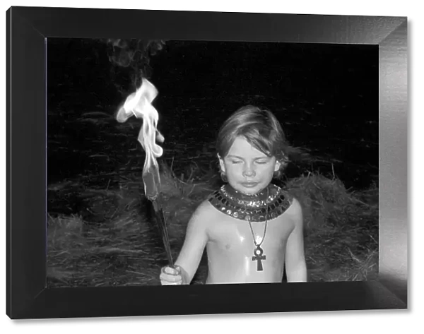 Unusual: Children. Fire Eater. 9 year old Tony Walls. December 1976 76-07502-009