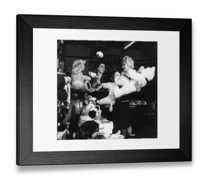 Framed Print : Keith and Viviene Nicholson who won £152000 on the Pools buying toys for her Framed Print : Keith and Viviene Nicholson who won £152000 on the Pools buying toys for her