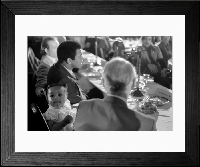 Framed Print : Cassius Clay. Muhammad Ali and daughter Hannah. Ali has baby sitter problems Framed Print : Cassius Clay. Muhammad Ali and daughter Hannah. Ali has baby sitter problems