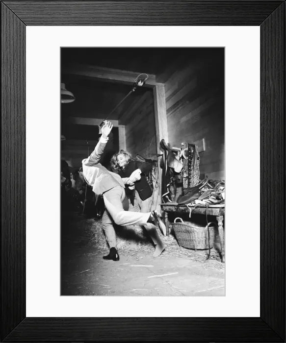 Framed Print : Honor Blackman as Pussy Galore and Sean Connery as James Bond seen here filming a fight Framed Print : Honor Blackman as Pussy Galore and Sean Connery as James Bond seen here filming a fight