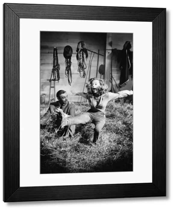 Framed Print : Honor Blackman as Pussy Galore and Sean Connery as James Bond seen here filming a fight