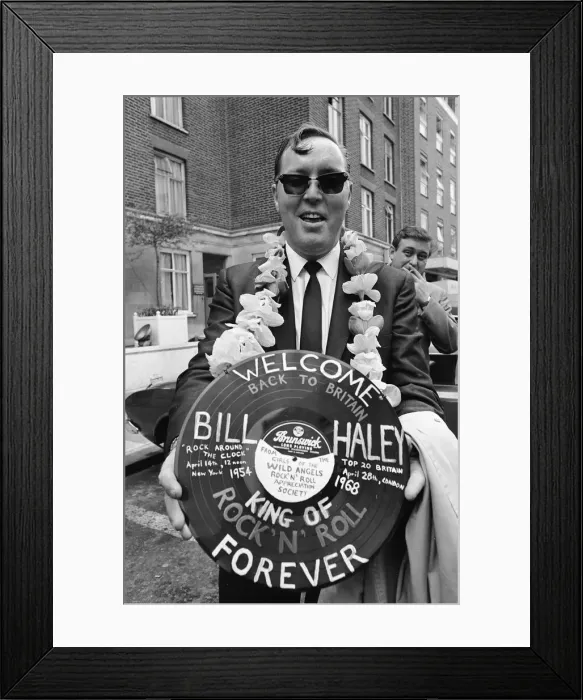 Framed Print : American rock and roll singer Bill Haley holds a record with a Welcome Back to Britain Framed Print : American rock and roll singer Bill Haley holds a record with a Welcome Back to Britain