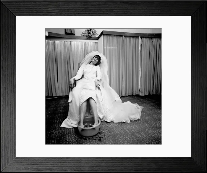 Framed Print : The thing that every bride must long to do at the end of her greatest, happiest