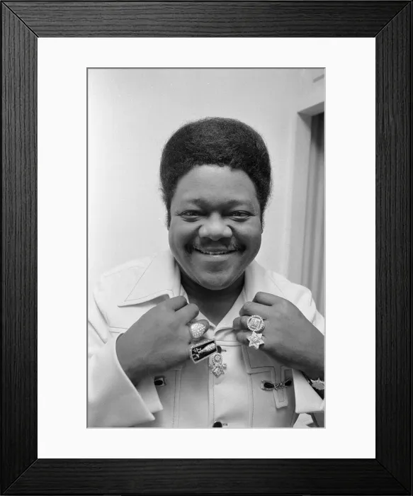 Framed Print : American rock and roll singer and musician Fats Domino shows off his diamond rings in his