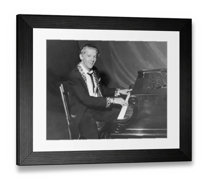 Framed Print : American rock and roll singer and musician Jerry Lee Lewis photgraphed sitting at his