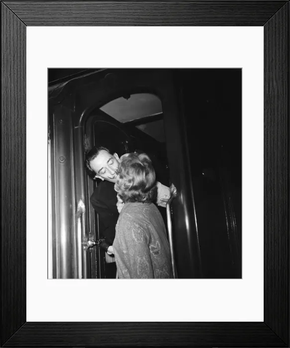 Framed Print : Artist Salvador Dali arrives in the UK, on the continental boat train to promote his Framed Print : Artist Salvador Dali arrives in the UK, on the continental boat train to promote his