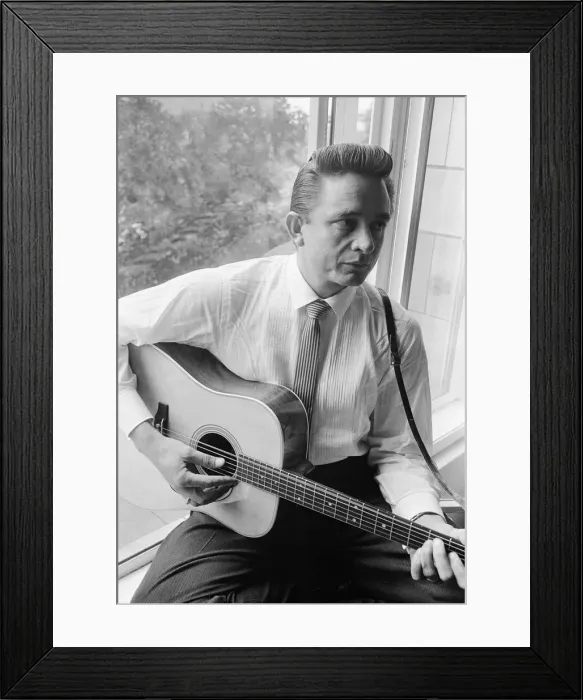 Framed Print : American country singer and musician Johnny Cash poses for photographers at the Savoy Framed Print : American country singer and musician Johnny Cash poses for photographers at the Savoy