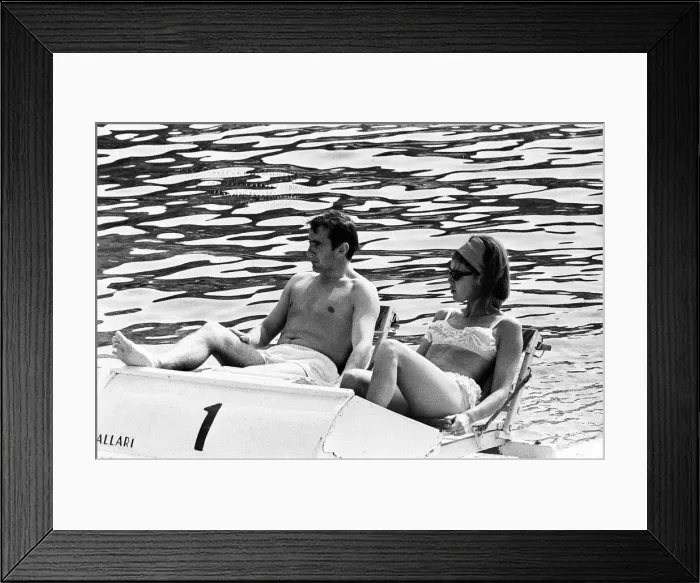 Framed Print : Monaco Grand Prix practice 1966. Jackie Stewart relaxes on a pedalo with his wife Helen