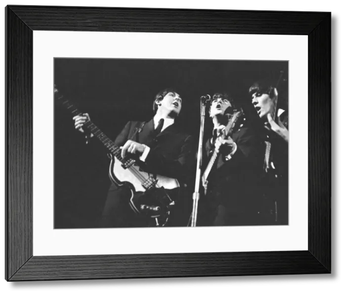 Framed Print : Beatles performing on stage, November 1964. Left to right are: Paul McCartney