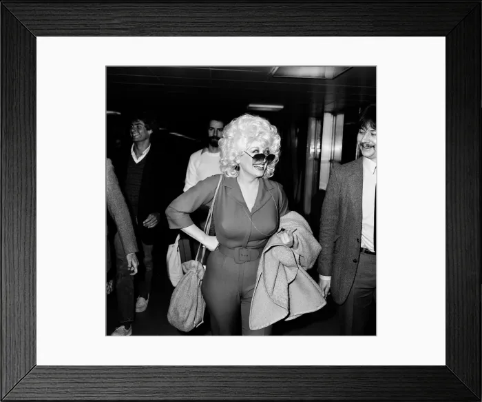 Framed Print : Country & Western singer Dolly Parton arrving at London Airport. 22nd March 1983