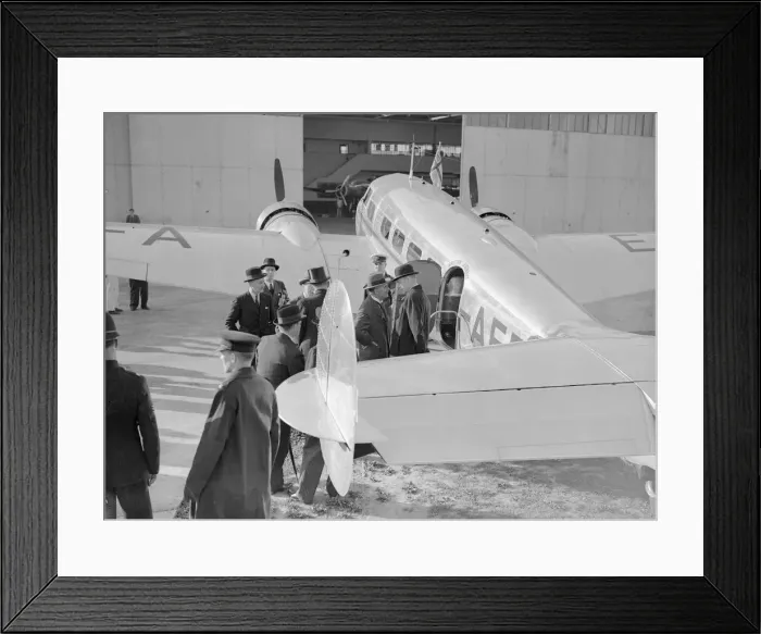 Framed Print : British Prime Minister Neville Chamberlain talks with Lord Halifax (in bowler hat