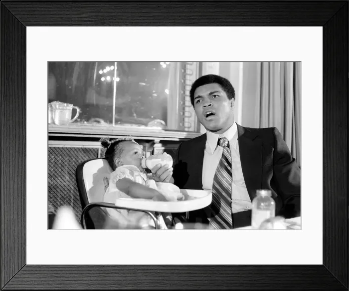 Framed Print : Cassius Clay. Muhammad Ali and daughter Hannah. Ali has baby sitter problems Framed Print : Cassius Clay. Muhammad Ali and daughter Hannah. Ali has baby sitter problems