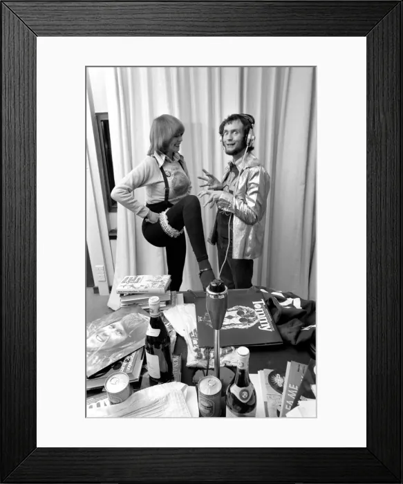 Framed Print : Kenny Everett and girl Jenny Stevens. March 1975 75-01674-001 Framed Print : Kenny Everett and girl Jenny Stevens. March 1975 75-01674-001