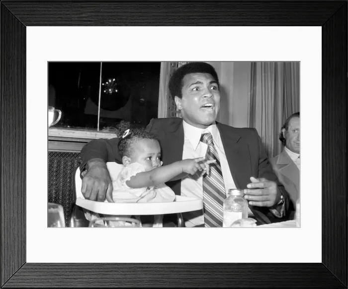 Framed Print : Cassius Clay. Muhammad Ali and daughter Hannah. Ali has baby sitter problems Framed Print : Cassius Clay. Muhammad Ali and daughter Hannah. Ali has baby sitter problems