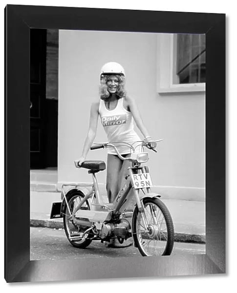 Publicity Dept: Girl on Bicycle. September 1975 75-04942