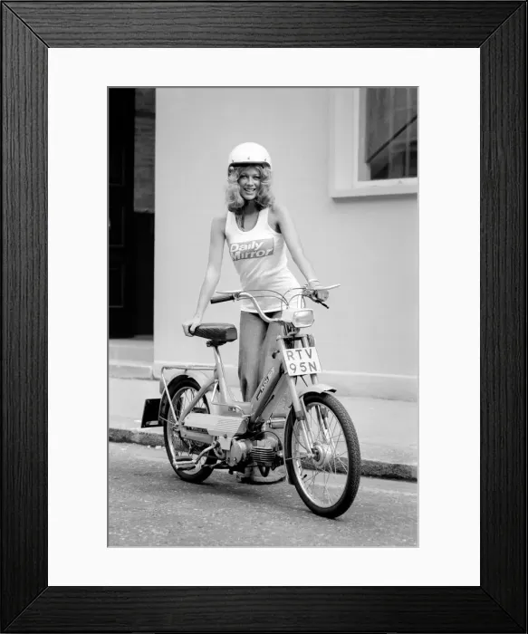 Framed Print : Publicity Dept: Girl on Bicycle. September 1975 75-04942 Framed Print : Publicity Dept: Girl on Bicycle. September 1975 75-04942