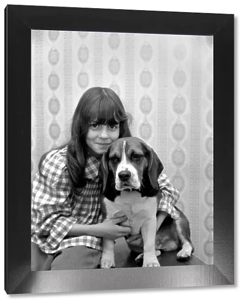 Girl and dog: Maxine Solvey and Beagle Shandy. March 1975 75-01260-002
