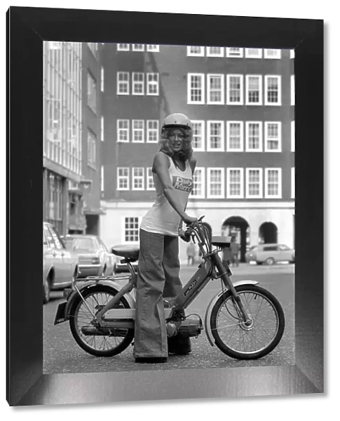 Publicity Dept: Girl on Bicycle. September 1975 75-04942-002