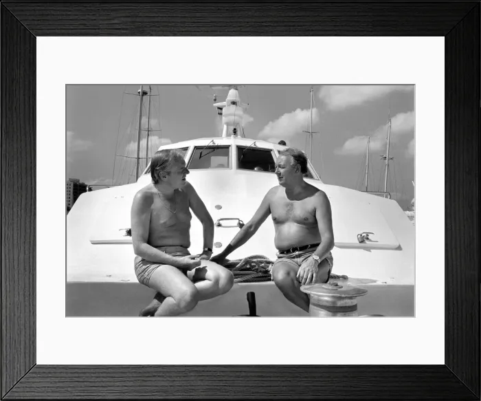 Framed Print : Freddie Laker: Entrepreneur with his motor cruiser in Majorca. July 1981 81-03733a-010