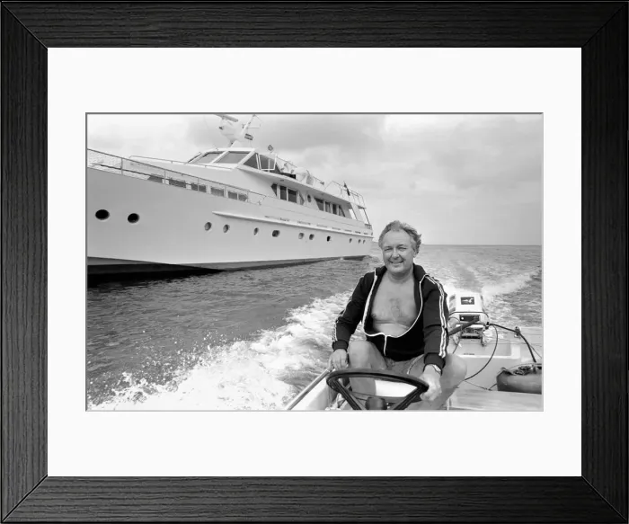 Framed Print : Freddie Laker: Entrepreneur with his motor cruiser in Majorca. July 1981 81-03733a-039 Framed Print : Freddie Laker: Entrepreneur with his motor cruiser in Majorca. July 1981 81-03733a-039