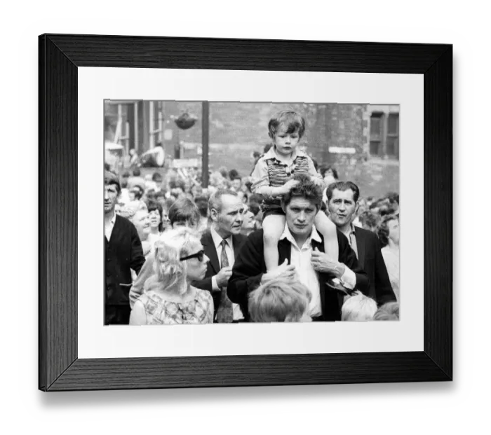 Framed Print : Durham Miners Gala - A child is carried on their fathers shoulders during the march Framed Print : Durham Miners Gala - A child is carried on their fathers shoulders during the march