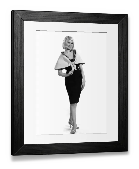 Framed Print : Reveille Fashions 1964: Vyvyan Dunbar modeling the latest in cape designs Framed Print : Reveille Fashions 1964: Vyvyan Dunbar modeling the latest in cape designs