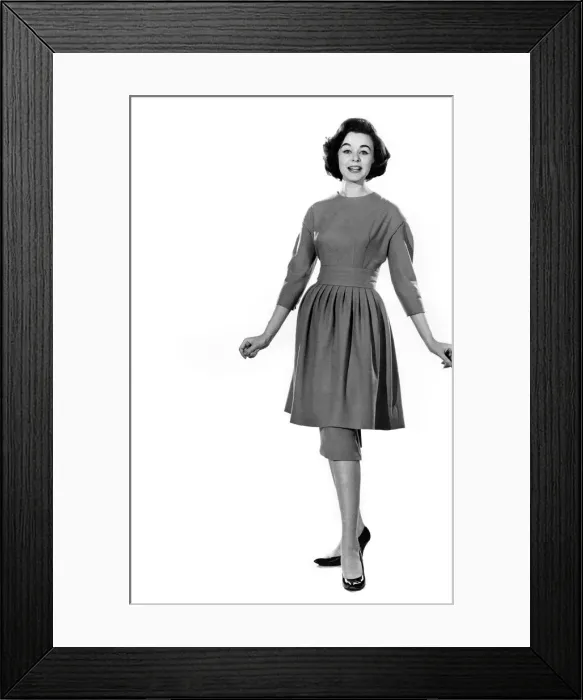 Framed Print : Mannequin Jackie Jackson seen here modeling a summmer dress with matching apron skirt