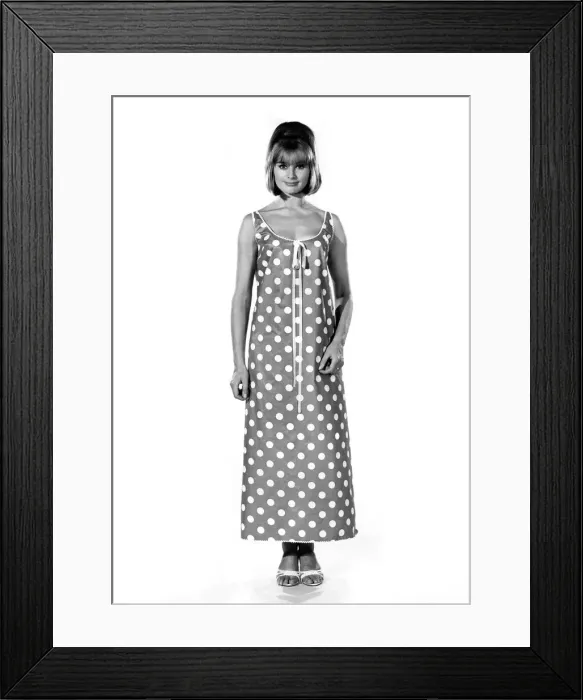 Framed Print : Reveille Fashions 1964: Margaret Larraine modeling a full length night dress with large Framed Print : Reveille Fashions 1964: Margaret Larraine modeling a full length night dress with large