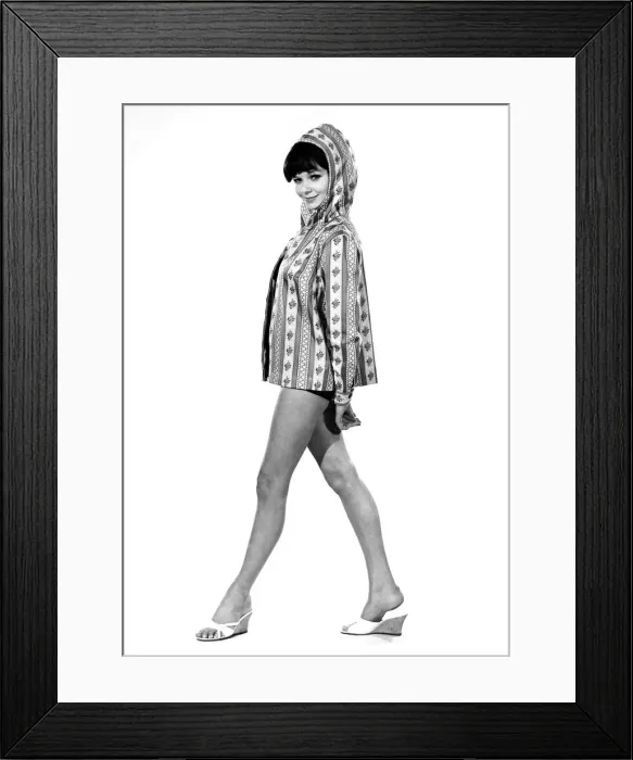 Framed Print : Reveille Fashions 1964: Meriel Weston modeling a hooded beach jacket. April 1964 P007619