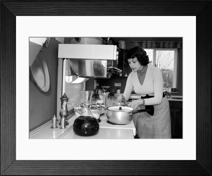Framed Print : Sonia Allison the Daily Mirror cook is seen here preparing a meal for a invited group of