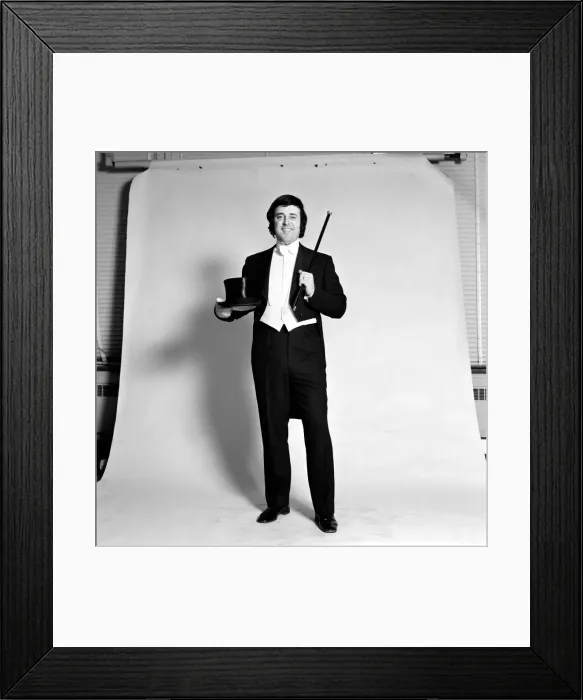 Framed Print : Disc Jockey Terry Wogan gets in the mood for his new compere job on BBC TV Framed Print : Disc Jockey Terry Wogan gets in the mood for his new compere job on BBC TV