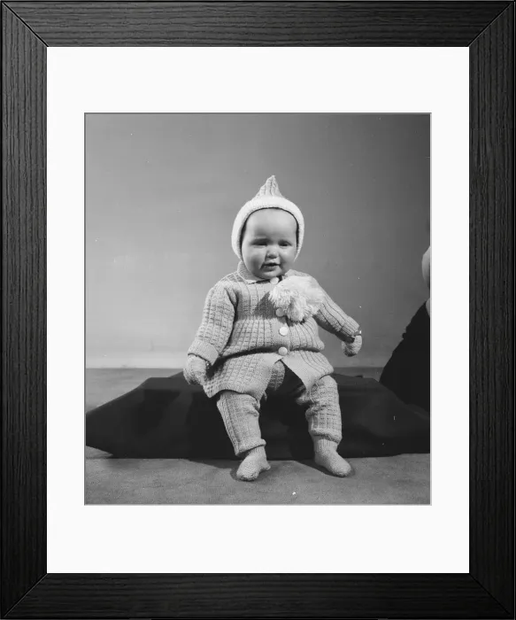 Framed Print : Unknown child model seen here modelling one of the years Reveille knitwear outfits Framed Print : Unknown child model seen here modelling one of the years Reveille knitwear outfits