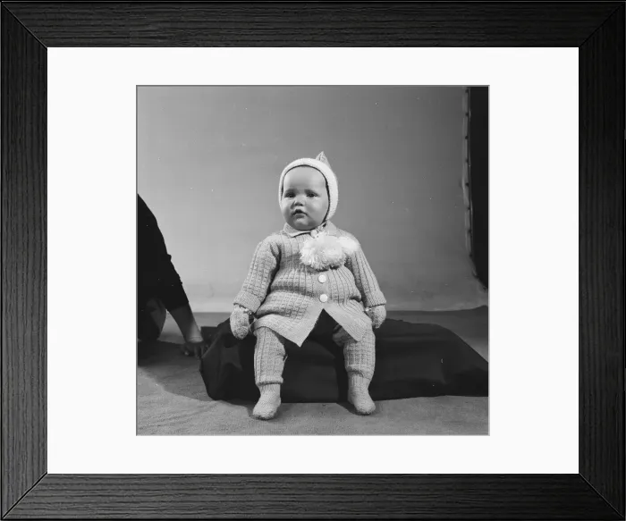 Framed Print : Unknown child model seen here modelling one of the years Reveille knitwear outfits Framed Print : Unknown child model seen here modelling one of the years Reveille knitwear outfits