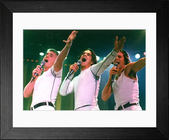 Framed Print : Pop heart-throbs Take That on stage at the Arena, NEC, Birmingham Framed Print : Pop heart-throbs Take That on stage at the Arena, NEC, Birmingham