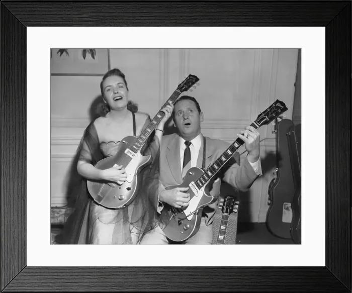 Framed Print : Les Paul singer, songwriter, guitarist & inventor pictured [performing with wife Mary Framed Print : Les Paul singer, songwriter, guitarist & inventor pictured [performing with wife Mary