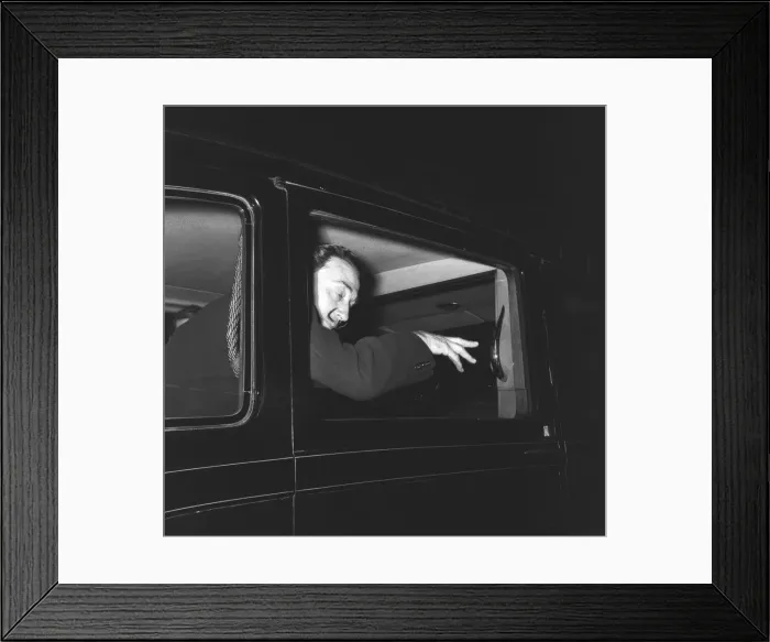 Framed Print : Artist Salvador Dali who recently arrived in the UK, on the continental boat train to Framed Print : Artist Salvador Dali who recently arrived in the UK, on the continental boat train to