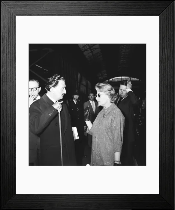 Framed Print : Artist Salvador Dali arrives in the UK, on the continental boat train to promote his Framed Print : Artist Salvador Dali arrives in the UK, on the continental boat train to promote his