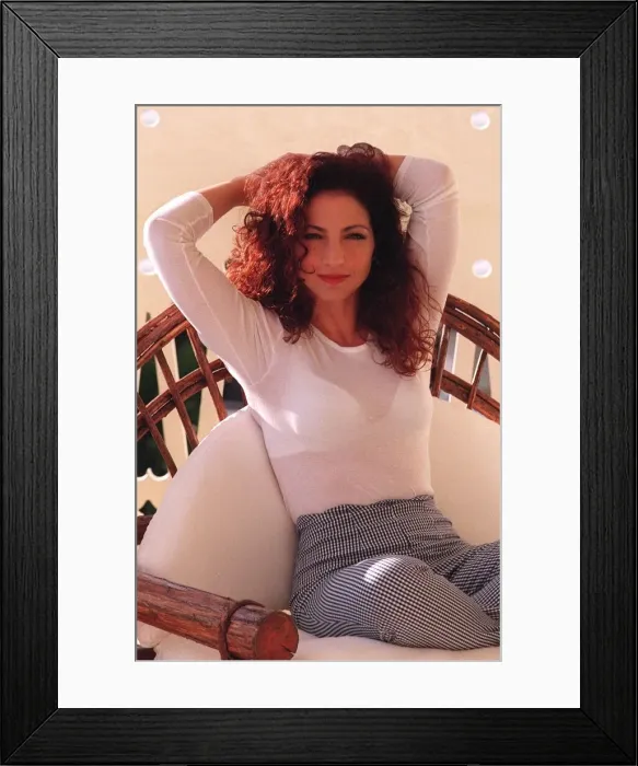 Framed Print : Gloria Estefan american singer pictured relaxing at home on Star Island in Miami Florida Framed Print : Gloria Estefan american singer pictured relaxing at home on Star Island in Miami Florida