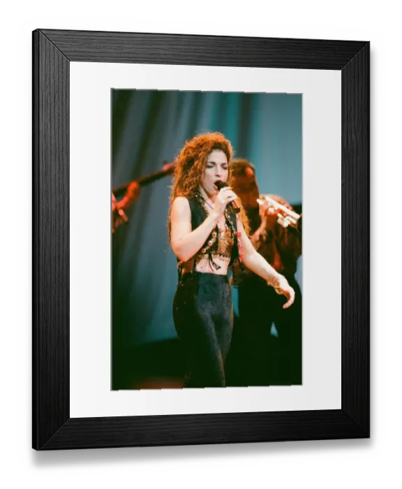 Framed Print : Pop singer Gloria Estefan performing on stage during a concert in Britain 24th Framed Print : Pop singer Gloria Estefan performing on stage during a concert in Britain 24th