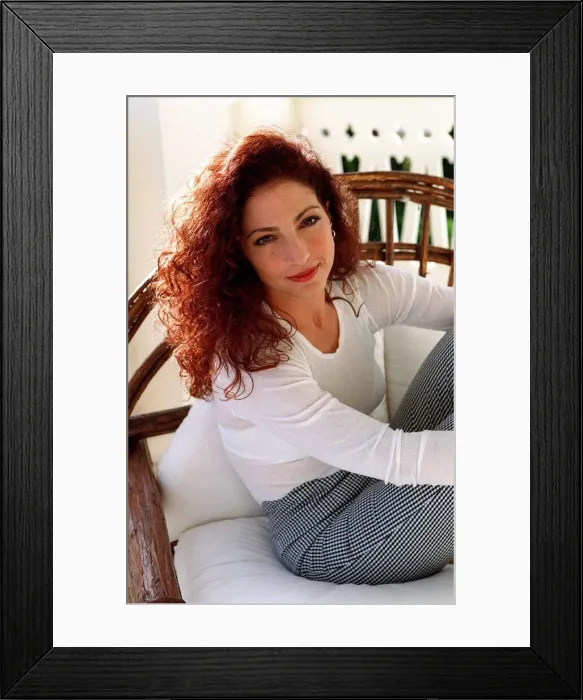 Framed Print : Gloria Estefan american singer pictured relaxing at home on Star Island in Miami Florida Framed Print : Gloria Estefan american singer pictured relaxing at home on Star Island in Miami Florida