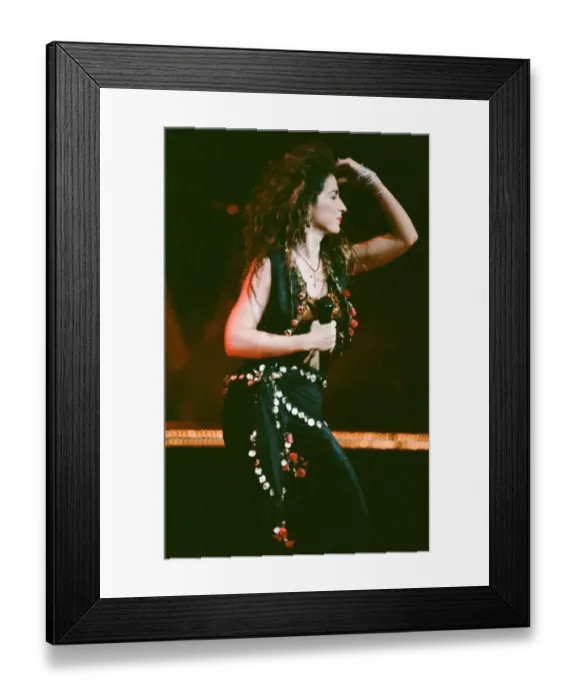 Framed Print : Pop singer Gloria Estefan performing on stage during a concert in Britain 24th Framed Print : Pop singer Gloria Estefan performing on stage during a concert in Britain 24th