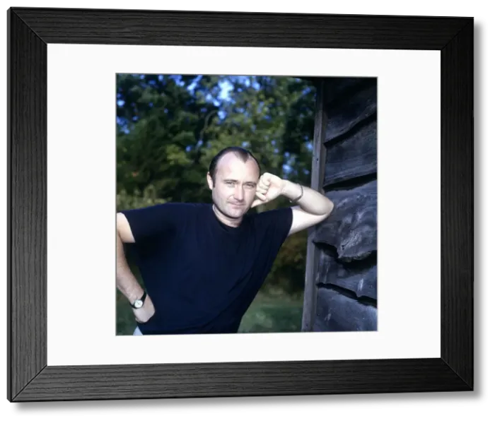 Framed Print : Phil Collins singer, songwriter & drummer pictured at home December 1989