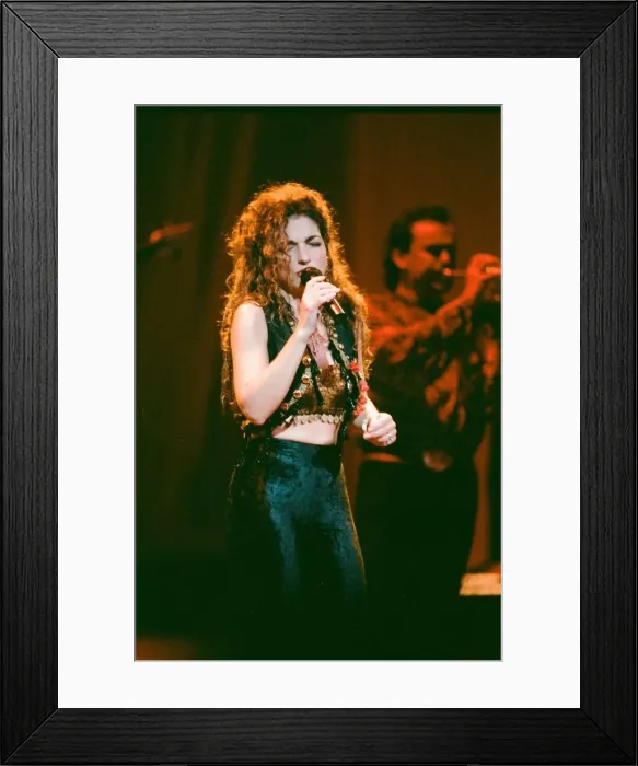 Framed Print : Pop singer Gloria Estefan performing on stage during a concert in Britain 24th Framed Print : Pop singer Gloria Estefan performing on stage during a concert in Britain 24th