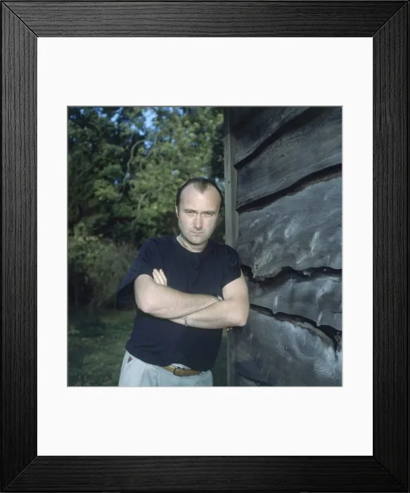Framed Print : Phil Collins singer, songwriter & drummer pictured at home December 1989
