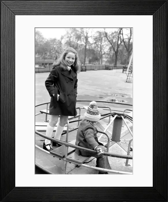 Framed Print : Child: Singer: Lena Zavaroni enjoying herself in Green Park, London. March 1975 75-01376 Framed Print : Child: Singer: Lena Zavaroni enjoying herself in Green Park, London. March 1975 75-01376