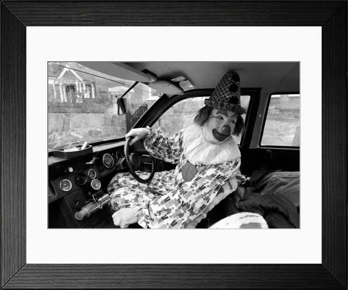 Framed Print : Child Entertainer: Mr. Blower the clown seen here in his car. March 1981 PM 81-01186-004 Framed Print : Child Entertainer: Mr. Blower the clown seen here in his car. March 1981 PM 81-01186-004